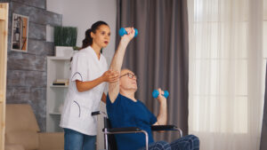 caregiver home health aide helping a senior client home care services